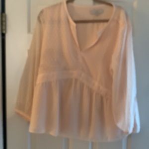 Gorgeous gently worn LOFT peach long sleeve peplum blouse size large.